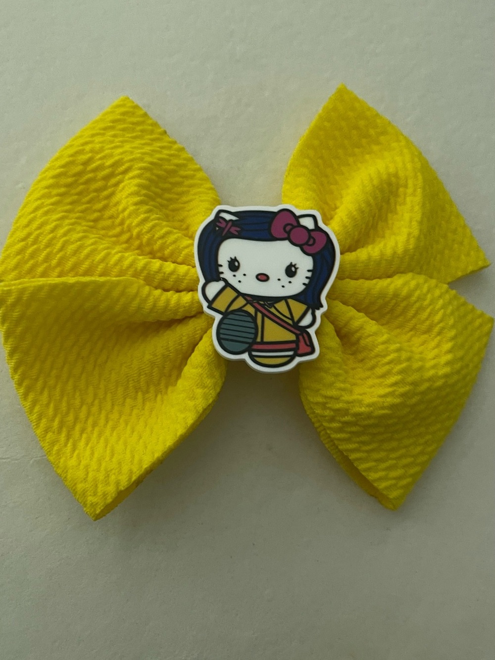 Coraline  Hello Kitty Yellow Bow Hair Clip with Pink Accent